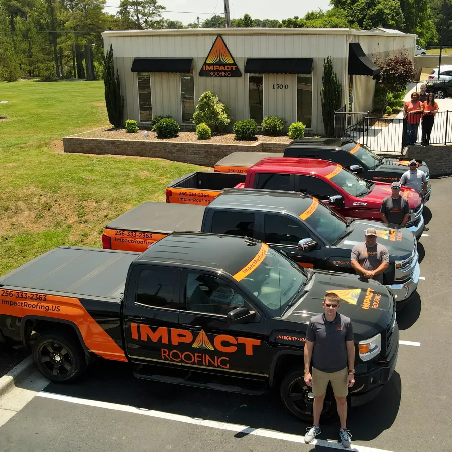 The IMPACT Roofing team outside the Athens, AL office
